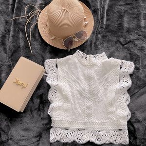 Saints + Secrets top